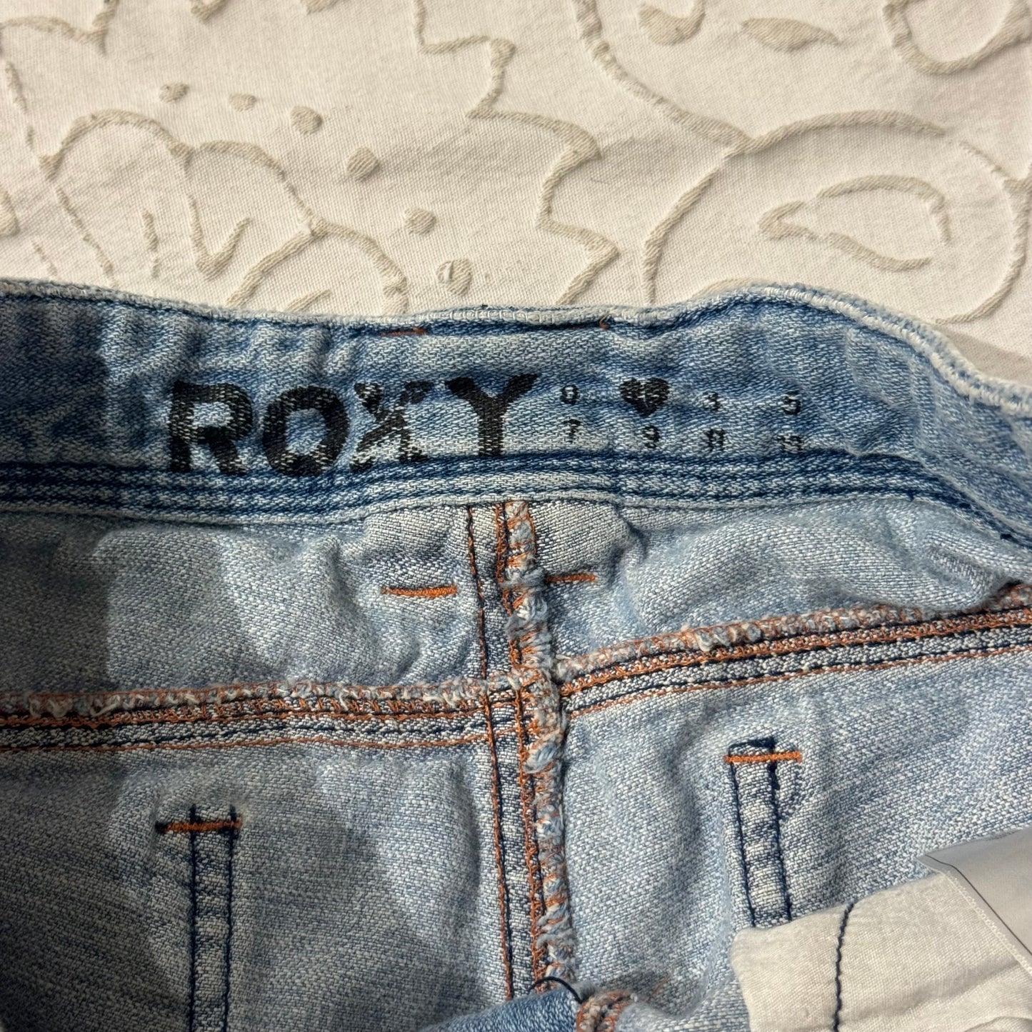 Light Washed ‘Roxy’ Denim Paint Splatter Low Rise Shorts