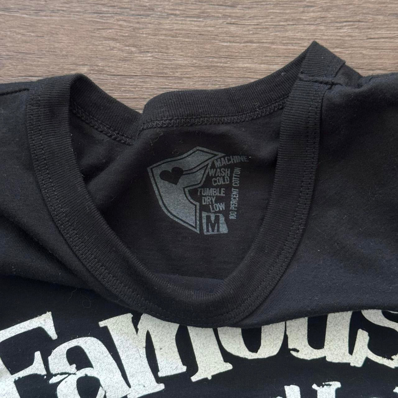 black & white famous straps and stars graphic juniors tee