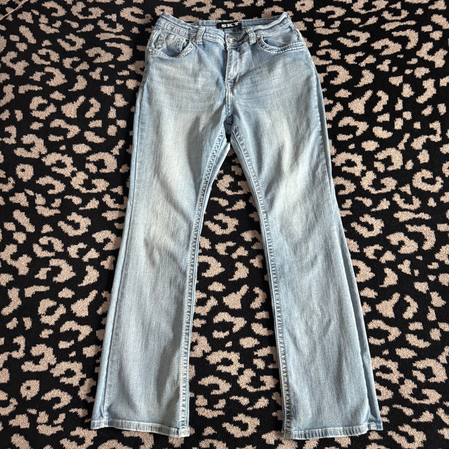 denim blue skull rhinestone high rise bootcut jeans (9/10)