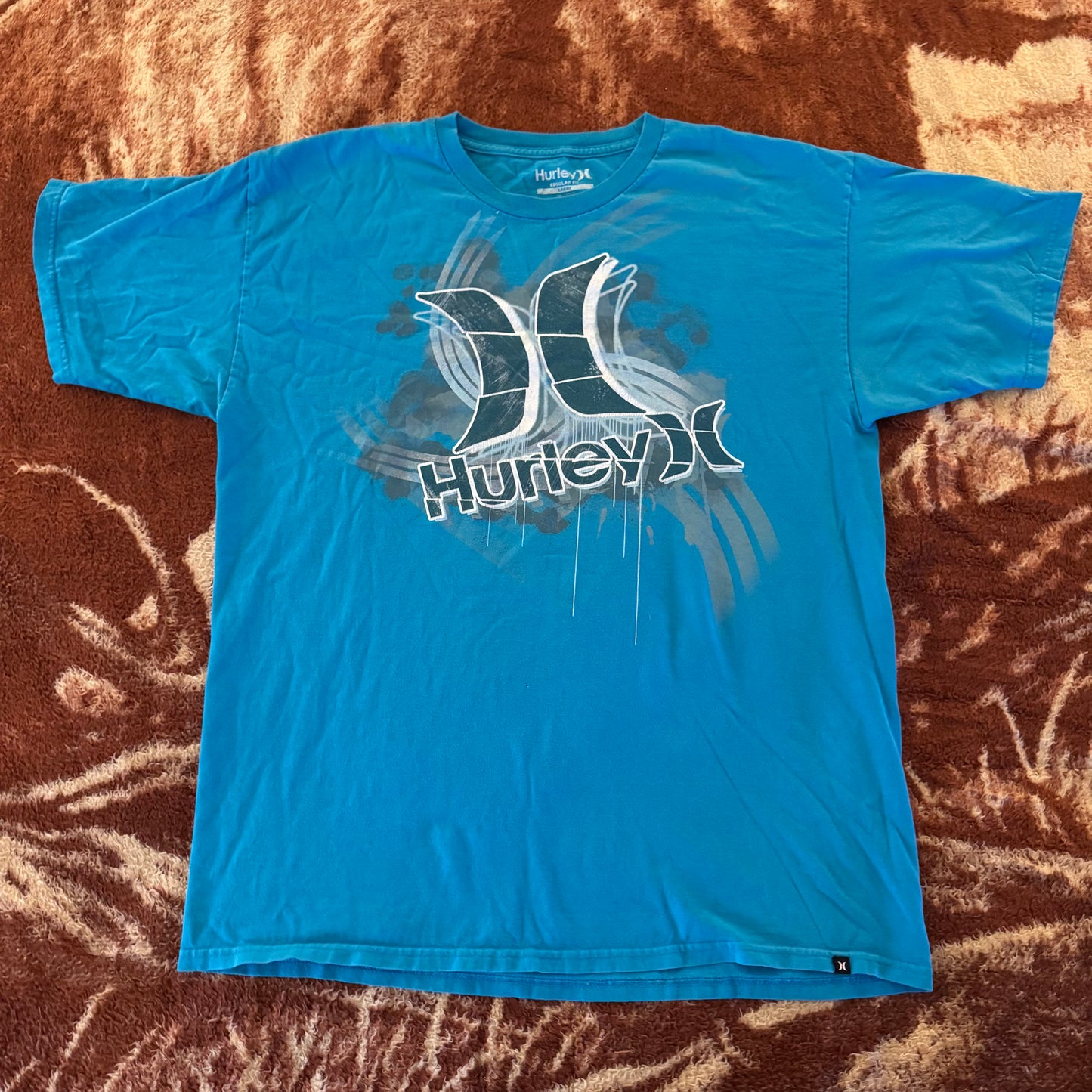 blue hurley surfer graphic short sleeve shirt (L)
