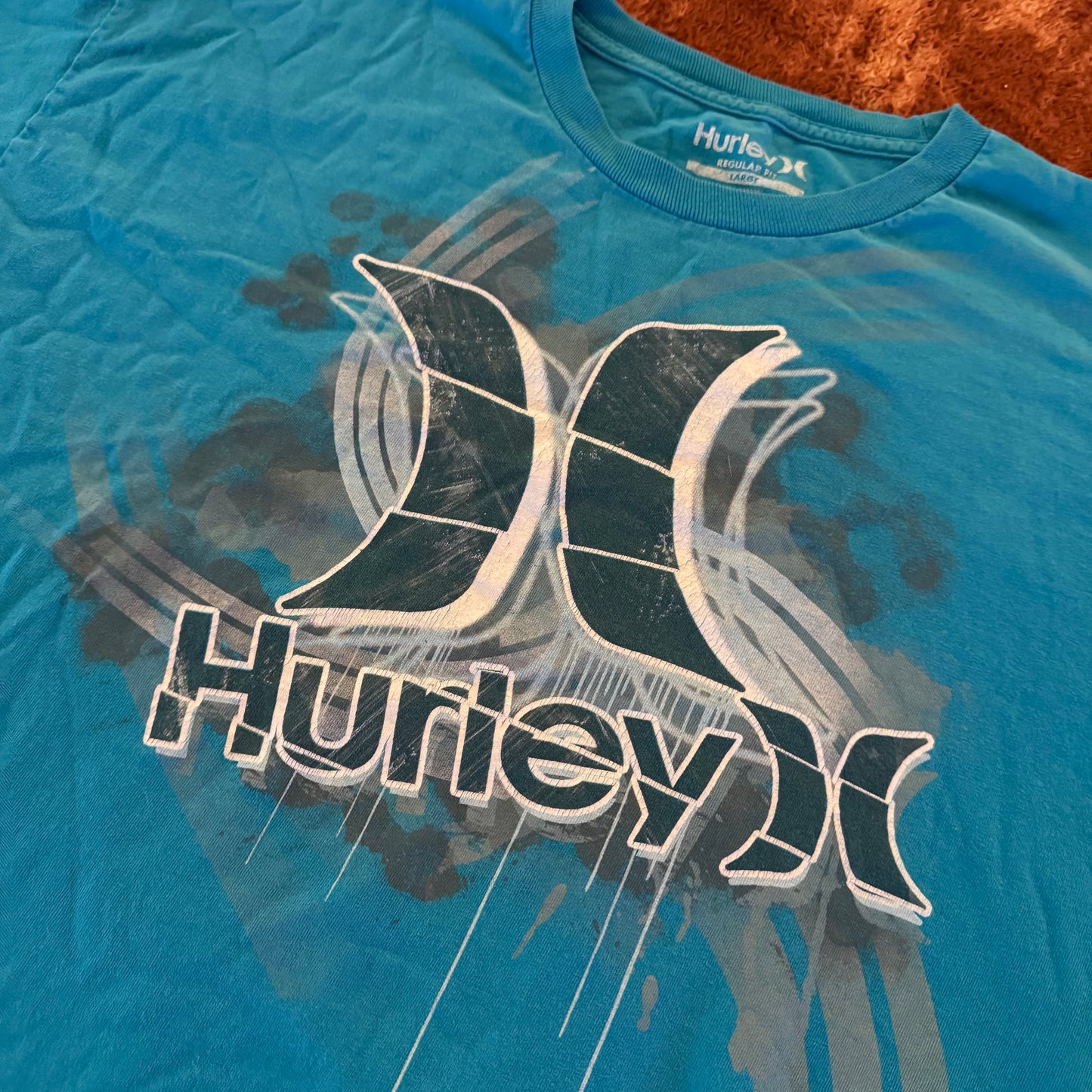 blue hurley surfer graphic short sleeve shirt (L)