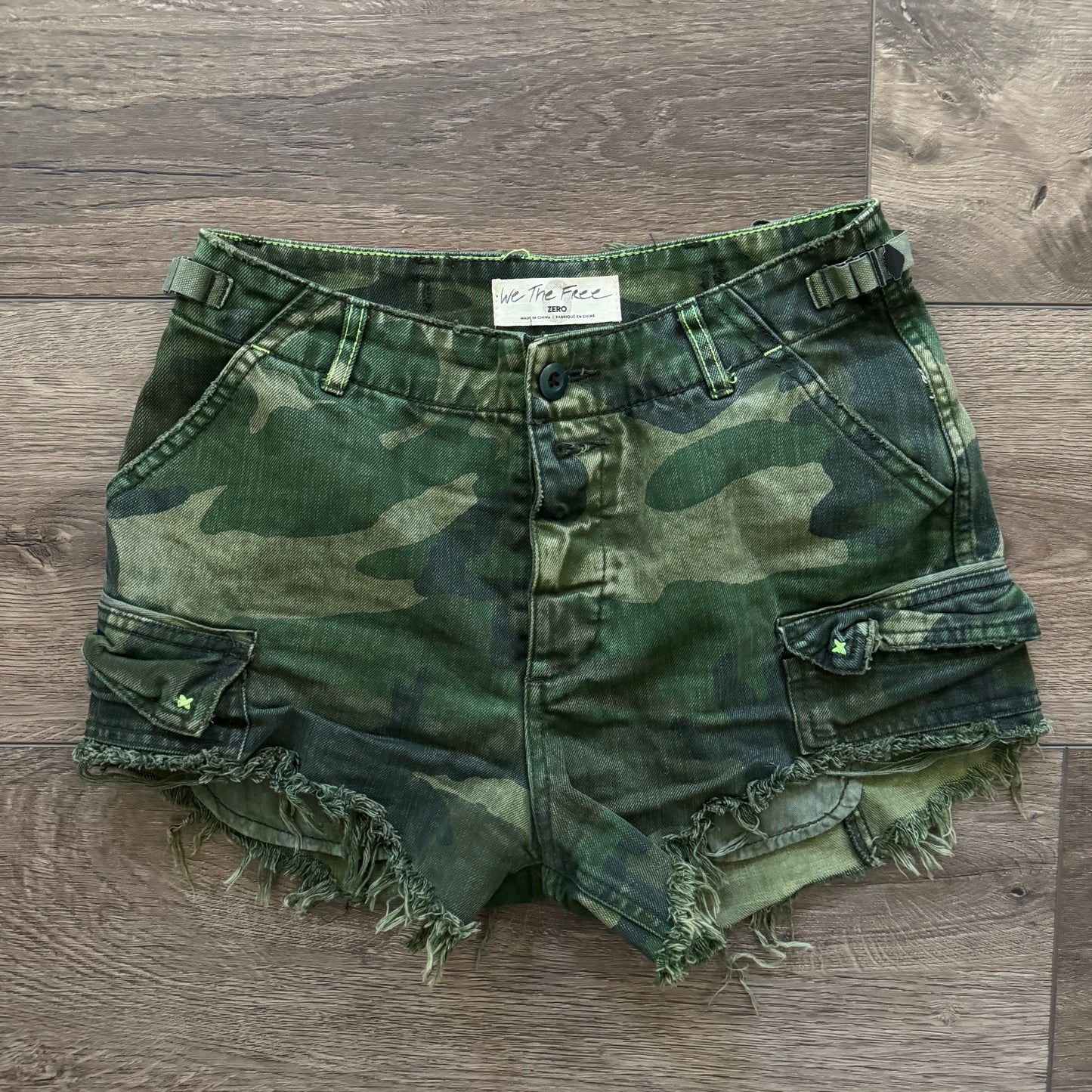 green camo commander distressed shorts
