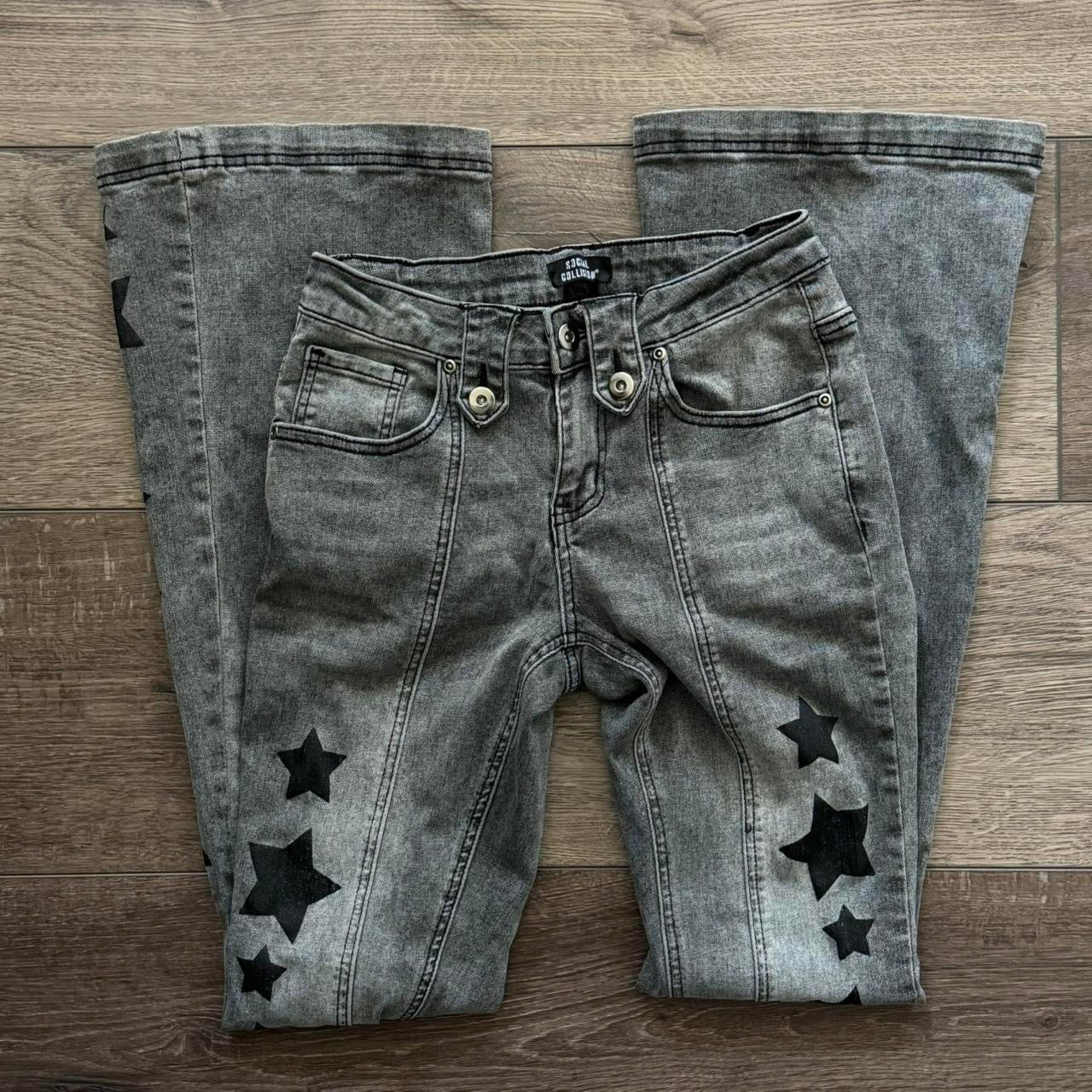 black social collision star embroidered midrise bootcut jeans