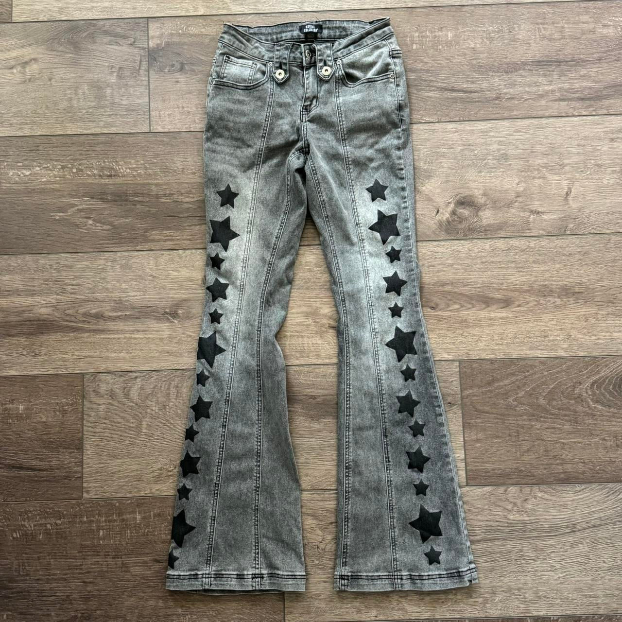 black social collision star embroidered midrise bootcut jeans