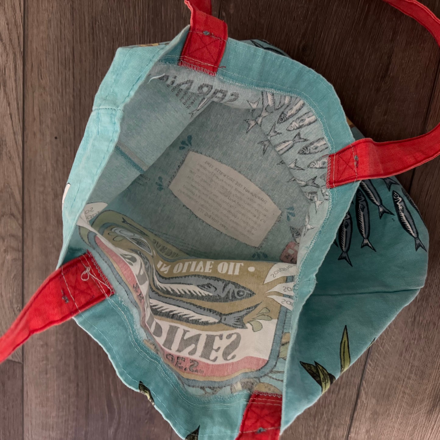 vibrant teal and red trader joe’s sardines tote bag