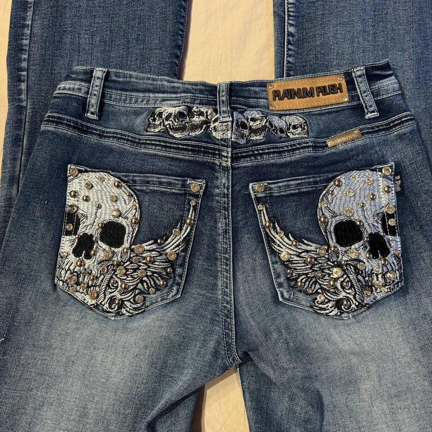 Denim Blue ‘Platinum Plush’ Skull Embroidered High Rise Bootcut Jeans