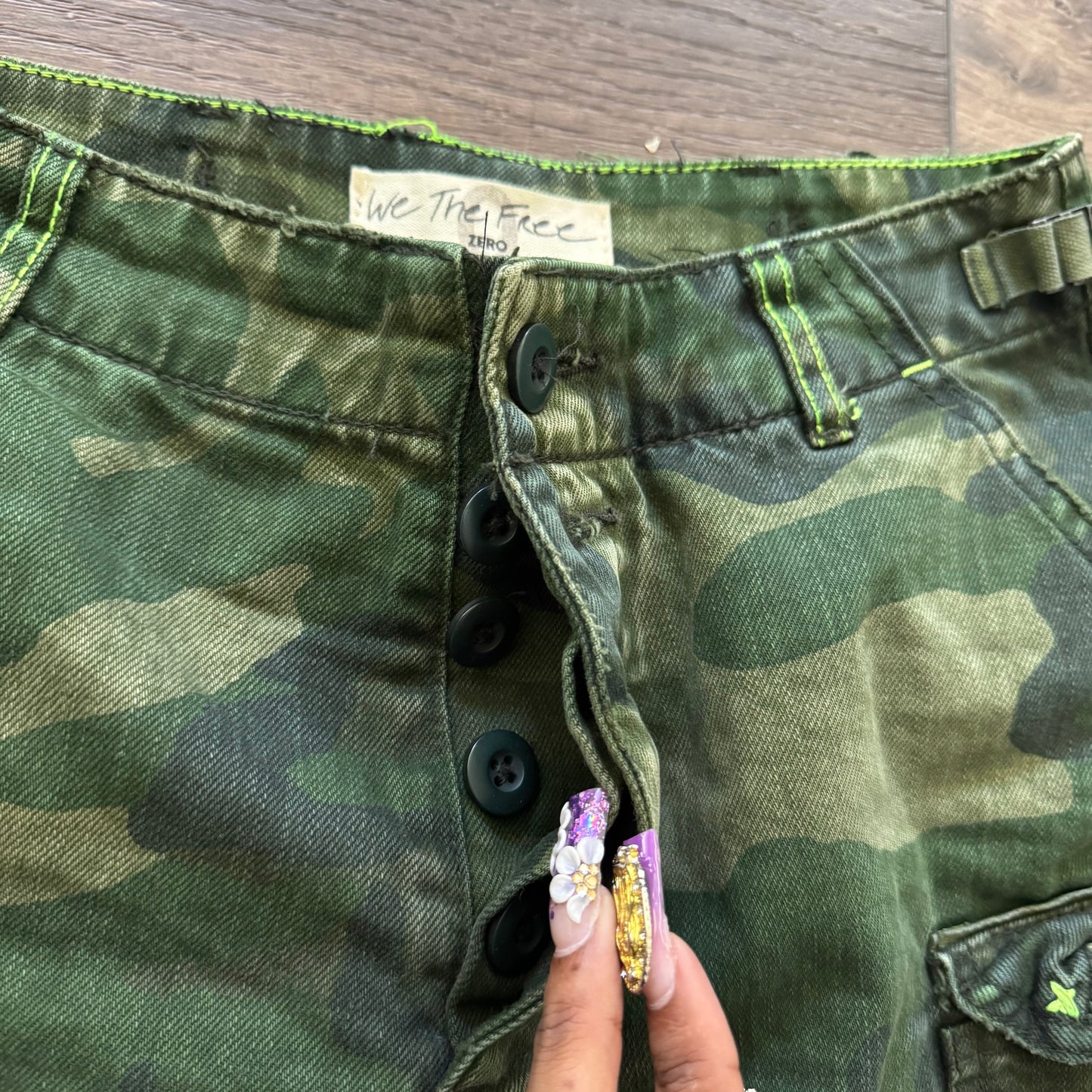 green camo commander distressed shorts