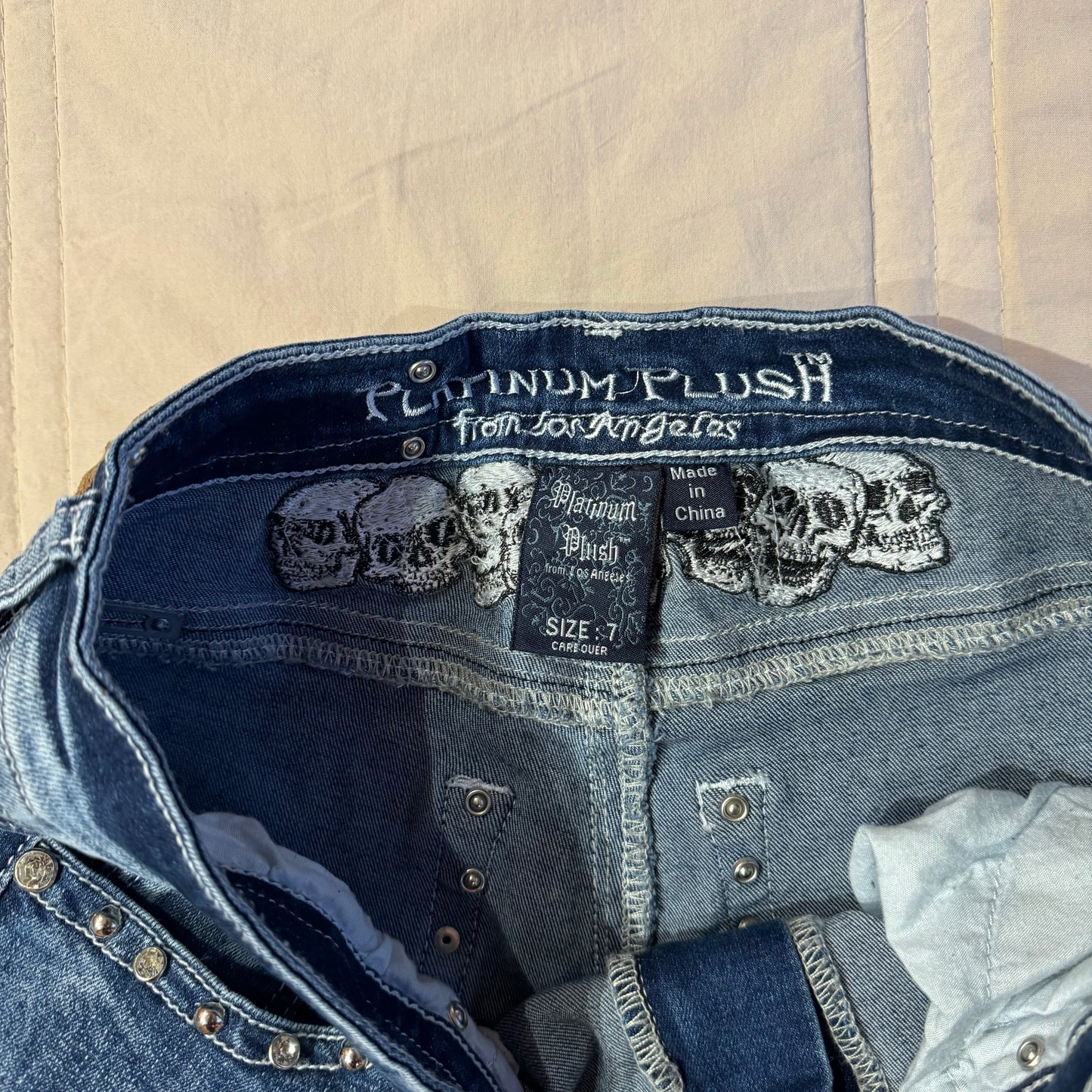 Denim Blue ‘Platinum Plush’ Skull Embroidered High Rise Bootcut Jeans