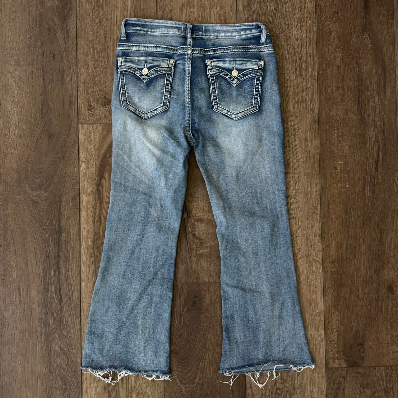 light blue distressed y2k rhinestone embellished contrast stitching highrise bootcut jeans